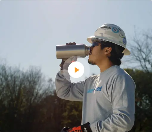 Waterfleet employee drinking water